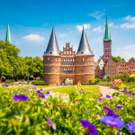 Historic town of Lübeck with famous Holstentor gate in summer, Schleswig-Holstein, northern Germany