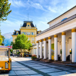 The post office (Post- und Telegrafen-Amt) and Trinkhalle from the imperial times of Austria in the town of Bad Ischl , Austria