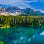 Bleu lake with mountains in the dolomites Italy, Carezza lake Lago di Carezza, Karersee with Mount Latemar